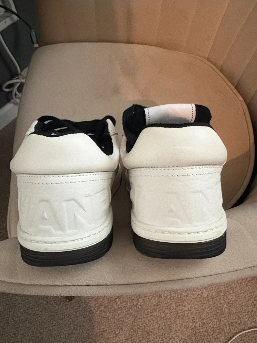 CHANEL White Leather Sneakers with Black Accents